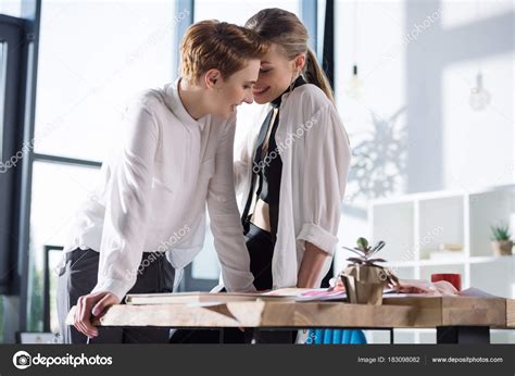 lesbian sex in an office